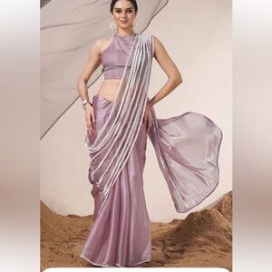 Saree with Beaded Detailing on pallu. 
Comes with petticoat & blouse piece.
